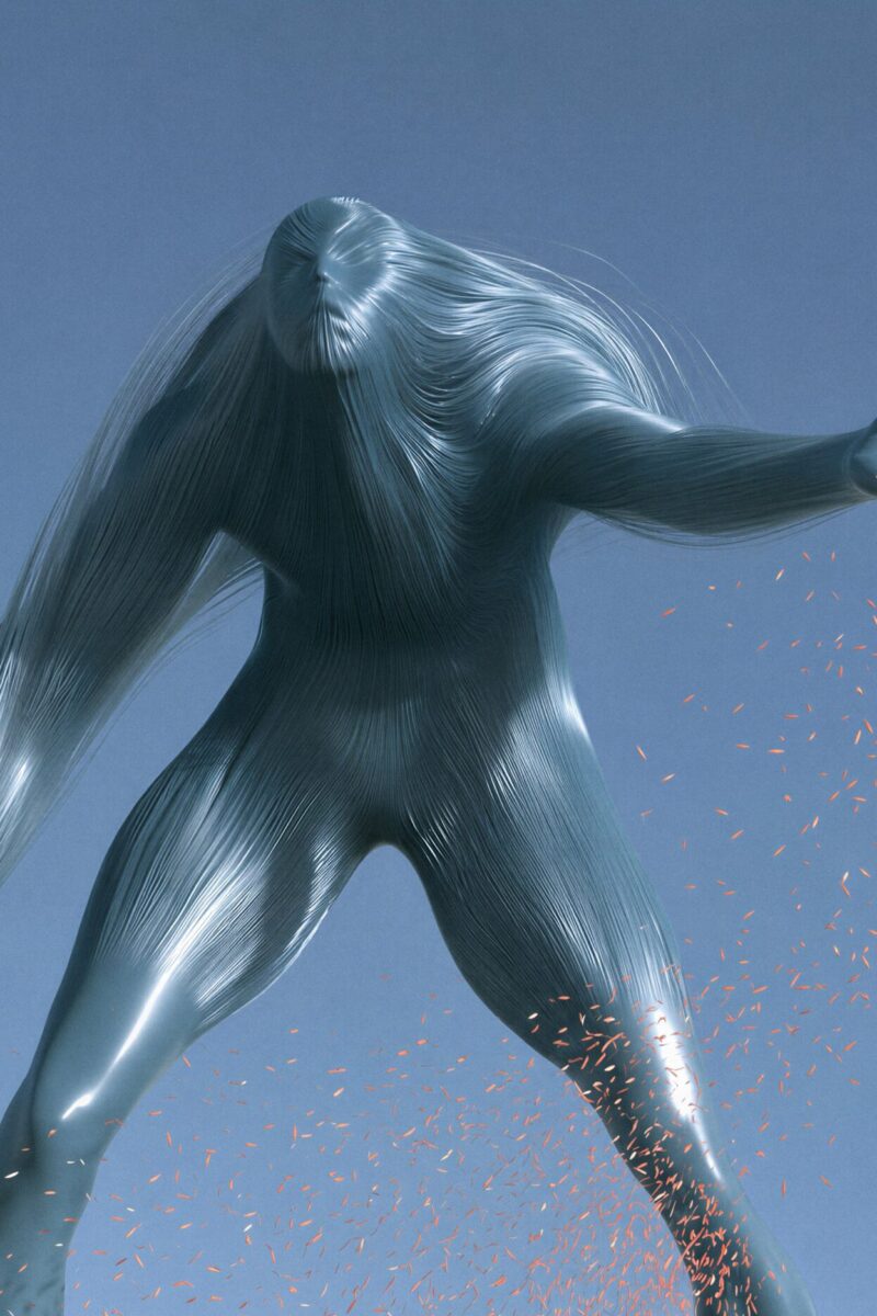 Figure géante bleu métallique tendant la main et dispersant des particules orange.